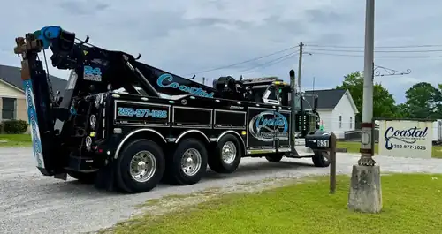 Coastal Towing rotator rear view with COASTAL branding